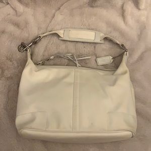 Coach White canvas shoulder bag with leather trim.